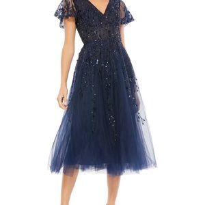 Stunning navy beaded tulle dress size 16. Worn only once-so many complements!